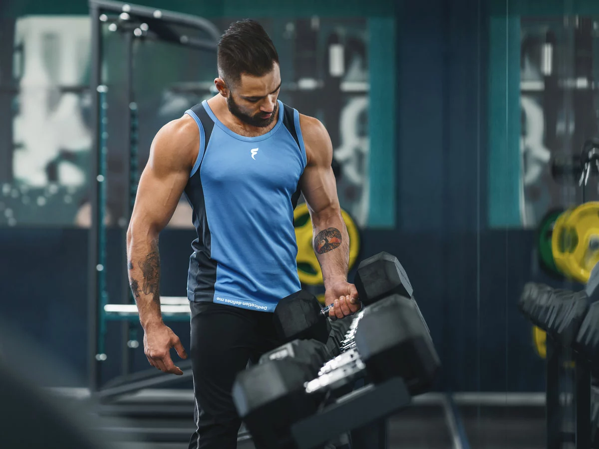 Man exercising while wearing Fortis clothing.